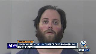 Man charged with 333 counts of child pornography