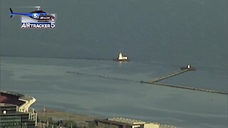 AirTracker 5 over rising waters near the breakwall