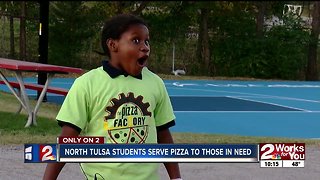 North Tulsa students serve pizza to those in need