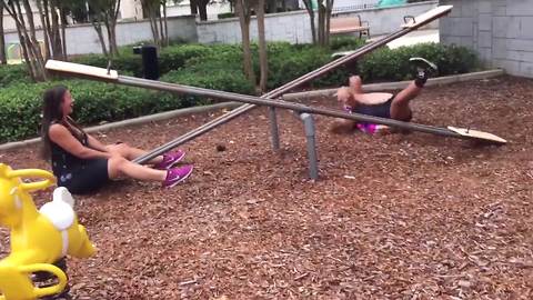 Girls Falls Off A See Saw While At The Playground