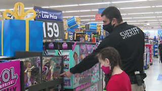 Local officers strive to brighten spirits amid pandemic with annual 'Shop with a Cop'