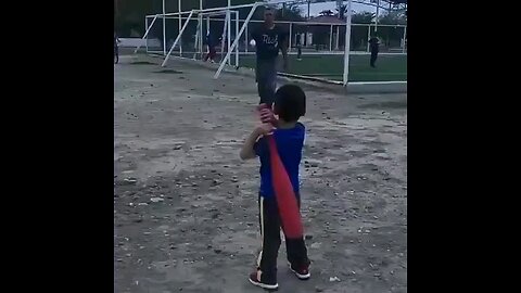 kid smacks man with baseball