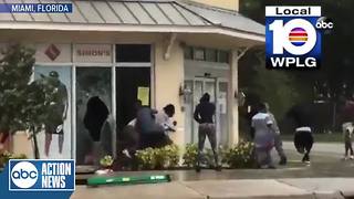 Looters caught on camera breaking into a store in Miami