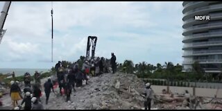 Search and rescue teams battling the odds to find survivors after Surfside condo building collapse