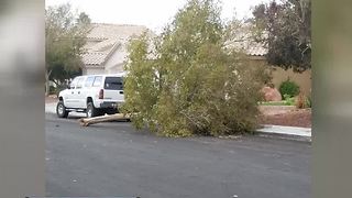 Strong winds damage homes, cars in Las Vegas neighborhood