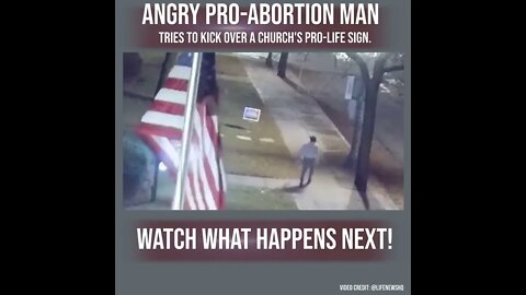 An angry pro-abortion man tries to kick over a church's pro-life sign. Watch until the end!