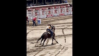 Barrel racing at the Calgary Stampede Rodeo