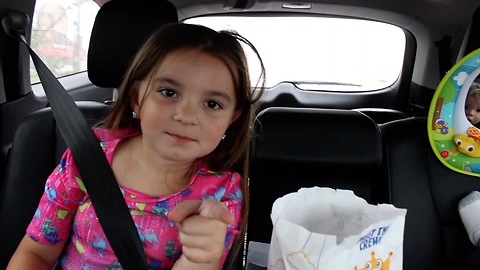 Little girl scolds dad for opening sunroof in rain