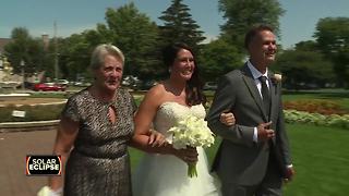 As nation celebrates, Wisconsin couple weds during solar eclipse