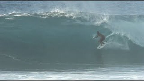 Pipeline: Locals, Pros, & World Champs enjoy a building North West swell at Backdoor. (12/12/02)