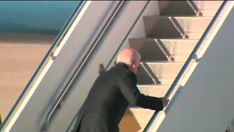 Biden Stumbles On Stairs As He Boards Air Force One