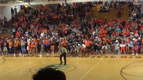 Cop Busts Out With Dance Moves At Pep Rally