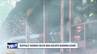 Buffalo woman helps man escape burning home