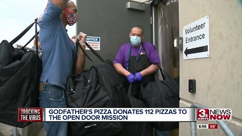 Godfather's Pizza donates pies to Open Door Mission