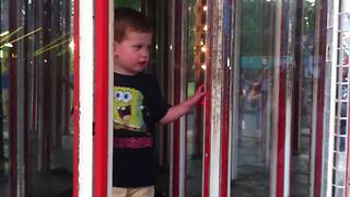 Hilarious Boy Crashes Into A Mirror In Mirror Maze