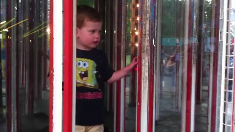 Hilarious Boy Crashes Into A Mirror In Mirror Maze