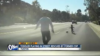 Dashcam video shows toddler playing in street rescued by former cop