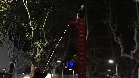 Beer crate climber reaches astonishing height