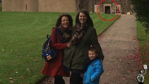 December 2016: Family photobombed by mysterious 'ghostly figure