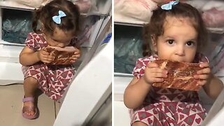 Hungry Little Girl Caught Red-handed Eating Bacon From The Fridge