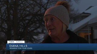 Snow remains in South Buffalo in the midst of a snow pick up pause due to a tragedy