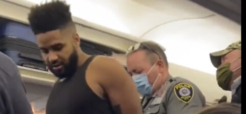 Black Drunk Passenger on Delta Flight assaults Air Marshall with the Race Card