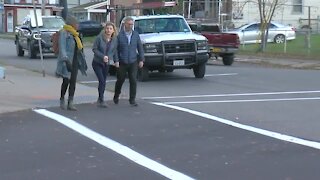 West side residents paint thier own crosswalks for safety