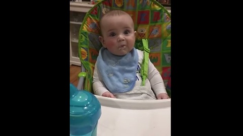 Baby can't hide his excitement for food!