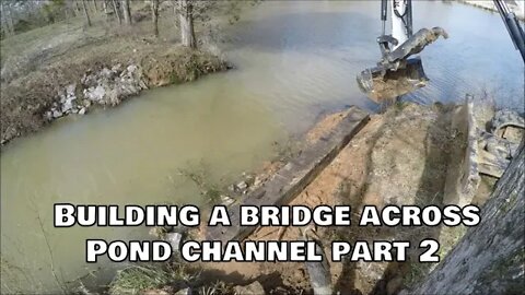Building a bridge over pond channel PART 2 setting the bases on a Budget; CTL/MTL & Mini Excavator