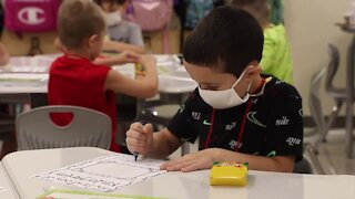 Parents in masking suit say they're fighting for the future