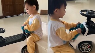 Toddler Takes Great Care Cleaning Toy Car