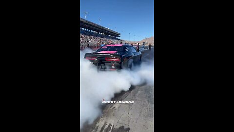 Dodge challenger hellcat on the track