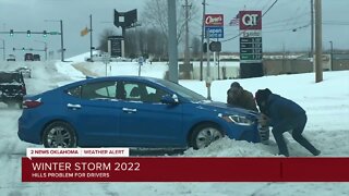 Drivers struggle passing through snow at Tulsa Hills