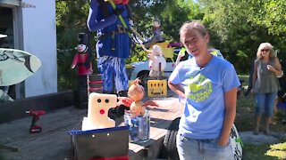 Friends create holiday parade float with trash found on the beach