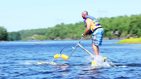 Bizarre motorless contraption skims across water