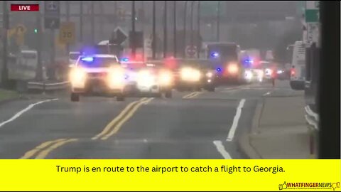 Trump is en route to the airport to catch a flight to Georgia.