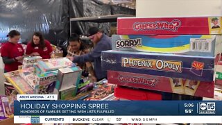 Foster parents enjoy Christmas shopping spree thanks to Arizona Helping Hands