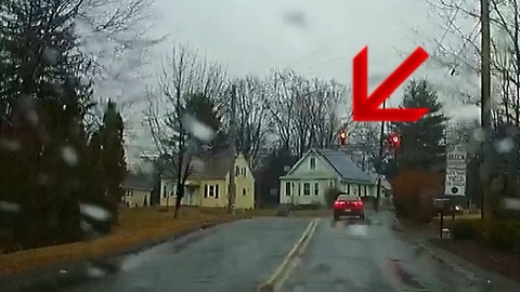 Stopped car runs red light