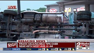 Truck hauling milk tips over in Southwest Tulsa