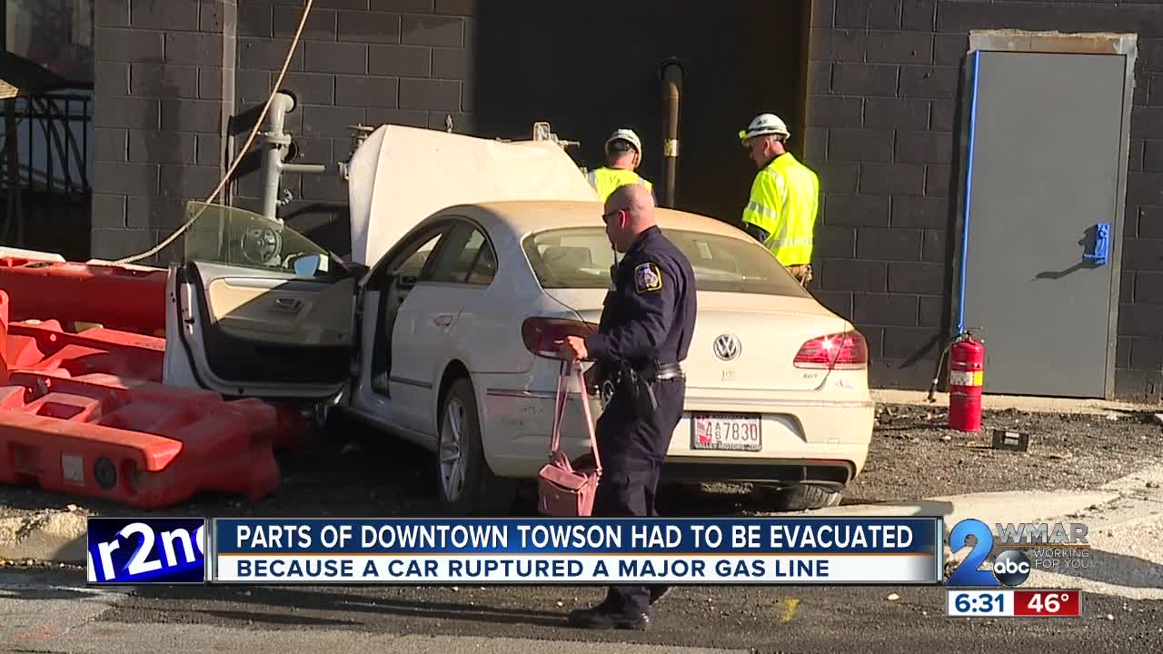 Car crashes into building near Towson Town Center causing evacuation, Hazmat situation