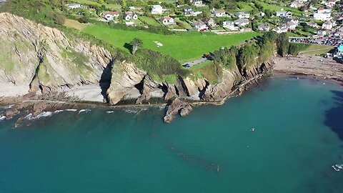 Admiring the rocky coastline of Combe Martin