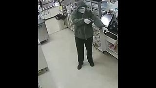 Video shows armed robbery suspect in Waterford Twp.