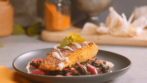 Rumi Spice Cumin Rubbed Pan Seared Salmon - Turmeric Swiss Chard, Tahini Cream Sauce