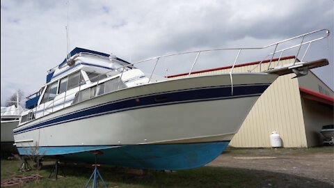 Taking off the winter cover, anodes, and bottom prep.