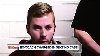 Ex-coach charged in sexting case