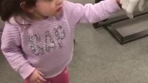 Little Girl Tries To Make Friends With a Mannequin
