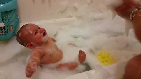 "Cute Baby Boy Laughs in Bubble Bath"