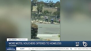 Men seen trying to remove rocks meant to deter homeless