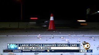 Large pothole damages several cars