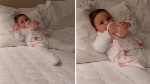 Adorable baby gets ready for bedtime